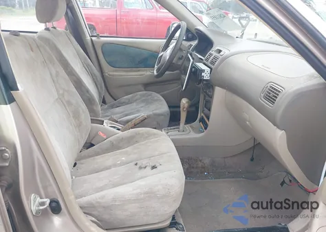 1998 Toyota Corolla Le from USA, damaged, VIN 2T1BR18E8WC023593